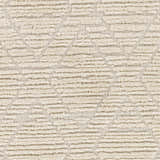 Close-up of the Maduao Area Rug. Bone and driftwood colors with a geometric pattern and textured weave. Swatch