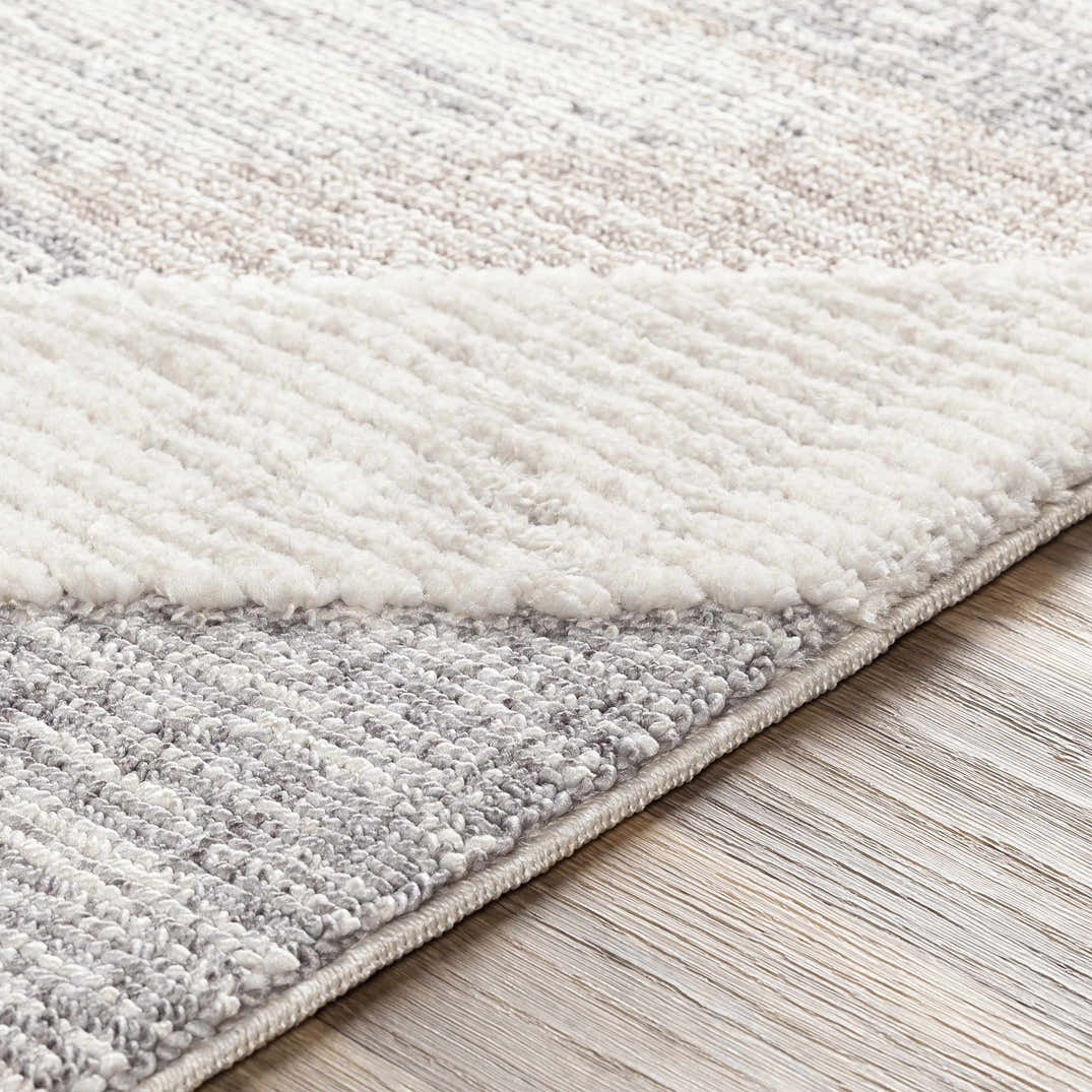 Magazine Geometric High/Low Pile Rug with Tassels - Clearance ...