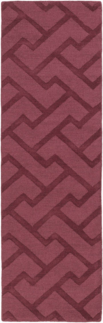Close-up of the Magness Area Rug. Plum wool rug with a contemporary geometric pattern. Hand-loomed texture. Design-Runner-268