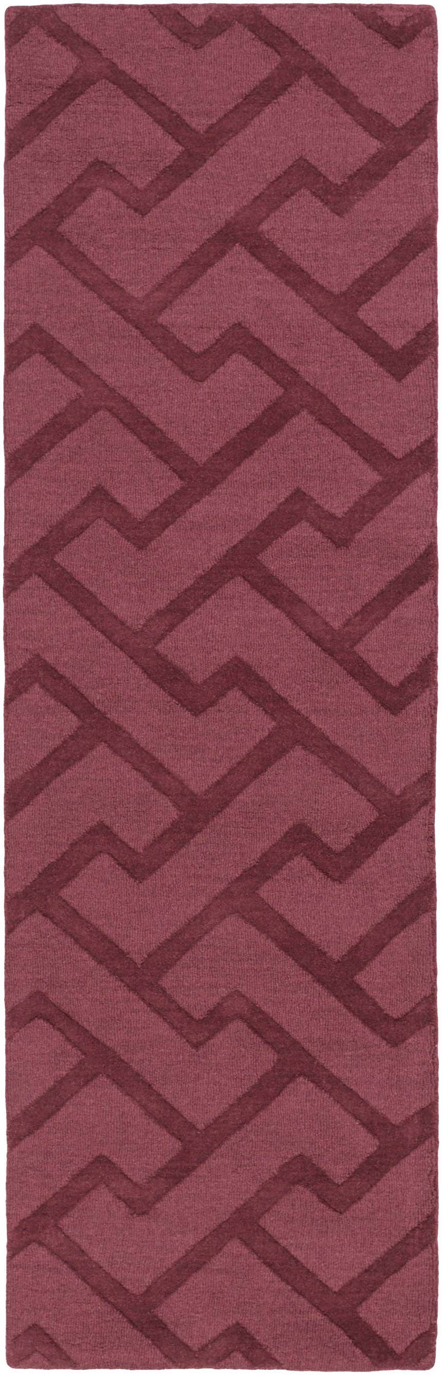 Close-up of the Magness Area Rug. Plum wool rug with a contemporary geometric pattern. Hand-loomed texture. Design-Runner-268