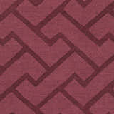 Close-up of the Magness Area Rug showing its plum color and contemporary geometric design. 100% wool texture. Swatch
