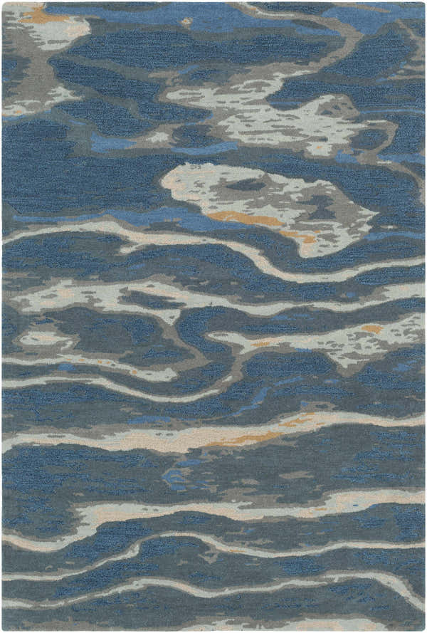 Close-up of the hand-tufted Maida Area Rug. Abstract pattern in blue, gray, tan, and burnt orange. 100% wool texture. Design-Rectangle-58