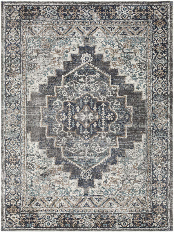 Detailed view of the Manaring Luxe Thick Area Rug, featuring a traditional geometric pattern in shades of gray, blue, and cream. Design-Rectangle-537