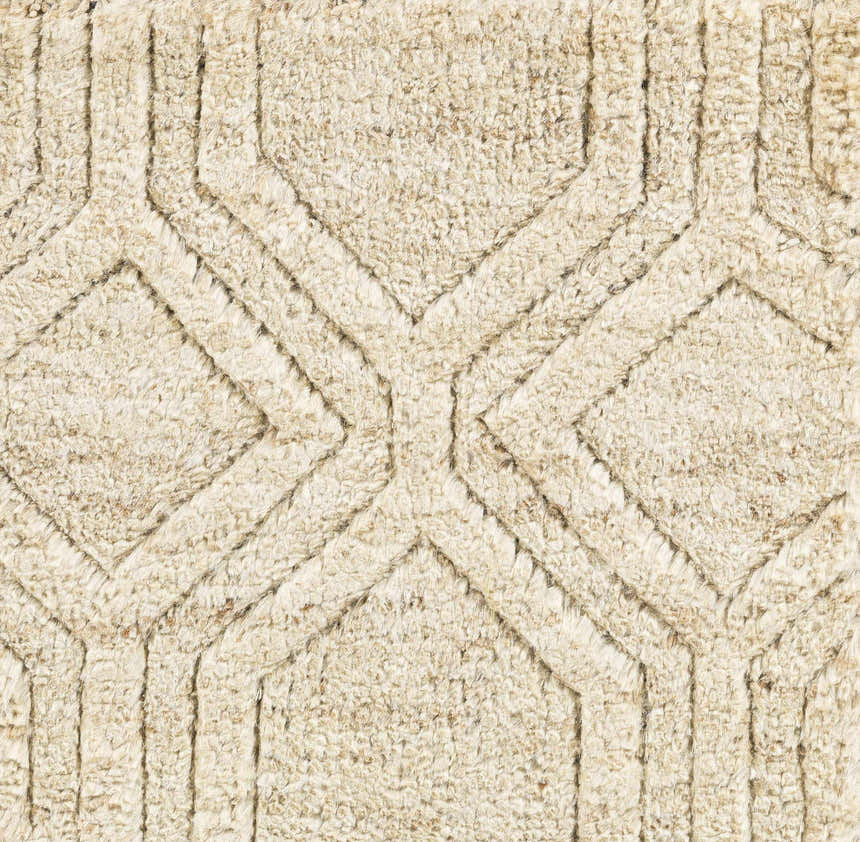 Close-up of the Manchester Clearance Jute Rug showing its natural jute fibers and geometric diamond pattern in beige and brown. Swatch
