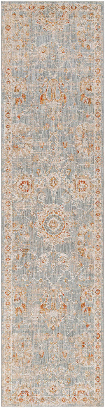 Close-up of the Mangham Thick Luxe Area Rug, featuring a traditional pattern in blue, beige, and rust tones. Design-Runner-2710
