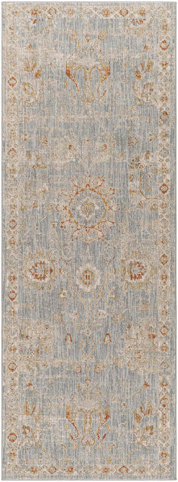 Close-up of the Mangham Thick Luxe Area Rug. Features an oriental pattern in light blue, beige, and brick red tones. Design-Runner-2773