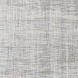 Close-up of the Manzanita Area Rug. Contemporary design in blue, cream, pale blue, and taupe. Machine woven texture. Swatch