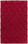 Close-up of the red Marilla Area Rug, a hand-woven wool shag with a diamond trellis pattern. Design-Rectangle-58