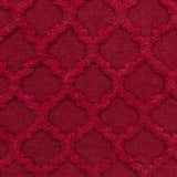 Close-up of the red Marilla Area Rug, a hand-woven shag with a geometric lattice pattern. Swatch