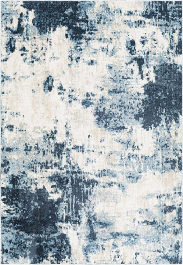 Close-up of the Masiga Washable Area Rug, a contemporary rug with a blue, navy, and cream abstract pattern. Design-Rectangle-537
