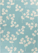 Close-up of the Matador Area Carpet. Aqua background with a light beige floral vine pattern. Hand woven, 100% wool. Design-Rectangle-811