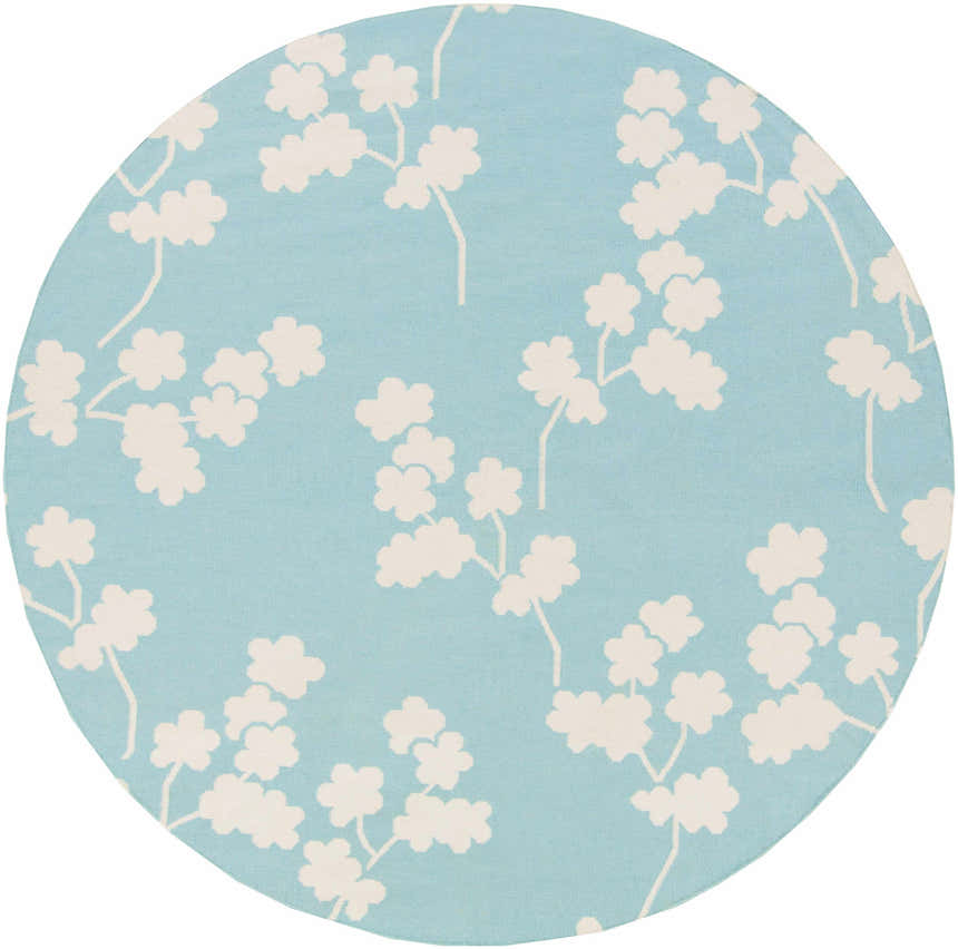 Close-up of round Matador Area Carpet. Aqua background with light beige floral branch pattern. Hand woven wool rug. Design-Round-8