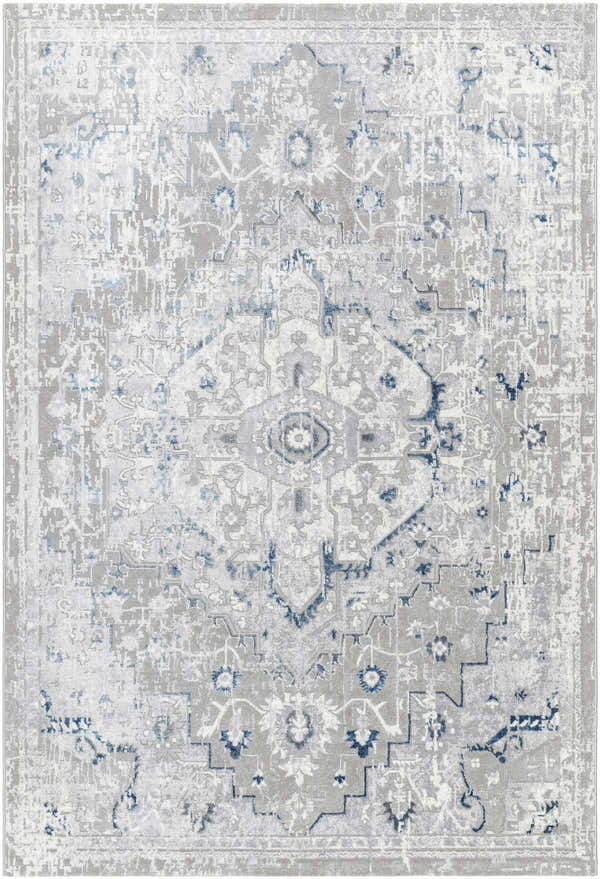 Close-up of the Mateo Area Rug, a traditional design in light gray, silver, and pale slate hues. Design-Rectangle-537