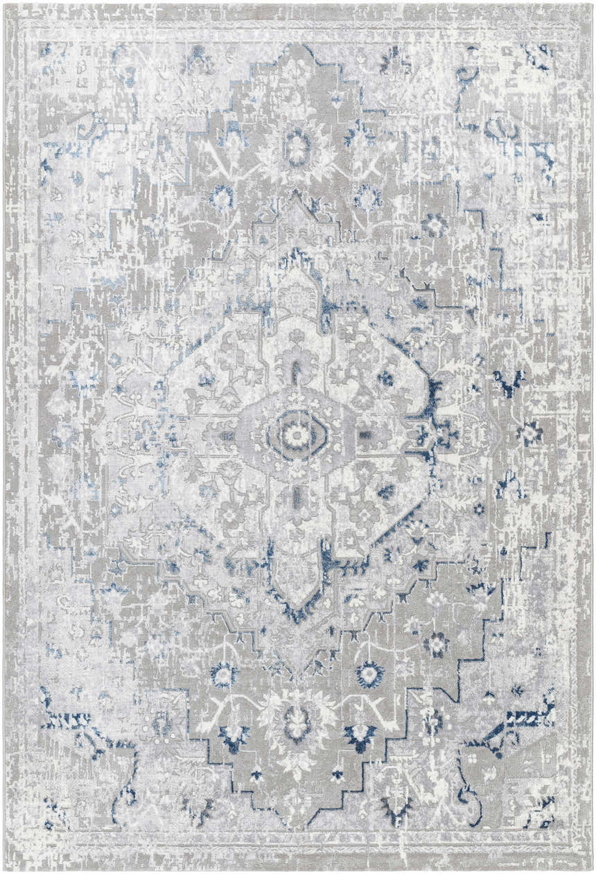 Close-up of the Mateo Area Rug, a traditional design in light gray, silver, and pale slate hues. Design-Rectangle-537