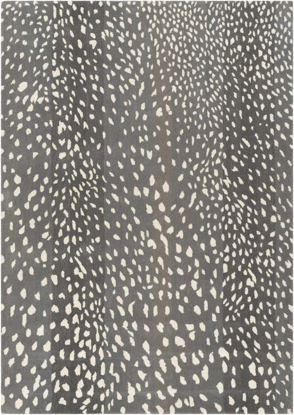 Close-up of the Athena Gray Giraffe Print Wool Rug. Cream spots on a gray, hand-tufted wool rug. Animal print rug. Design-Rectangle-58