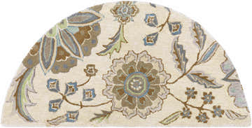 Close-up of the Mack Floral Wool Area Carpet. Hearth shape with brown, blue, and sage floral pattern on a tan background. Design-Hearth