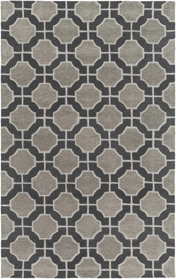 Close-up of the Mccammon Area Rug. Hand-tufted NZ wool rug in black, charcoal, and gray with a geometric pattern. Design-Rectangle