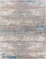 Close-up of the McCracken Area Rug, featuring a contemporary abstract pattern in blue, gray, and coral on a light background. Design-Rectangle-710102