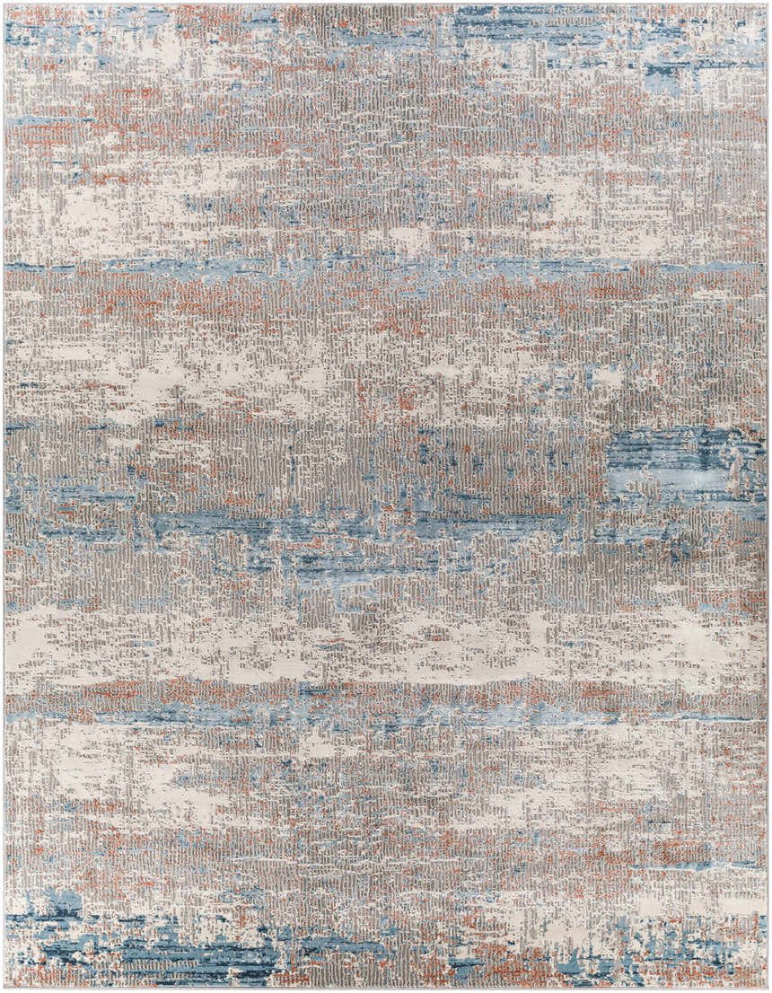 Close-up of the McCracken Area Rug, featuring a contemporary abstract pattern in blue, gray, and coral on a light background. Design-Rectangle-710102
