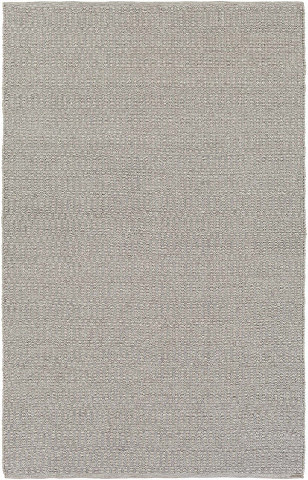 Close-up of the taupe Mcdonough Area Rug. Hand-woven polypropylene rug with a subtle geometric pattern and textured weave. Design-Rectangle