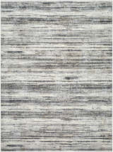 Close-up of Munya Area Rug's Southwestern design. Charcoal, cream, gray, and peach horizontal stripes. Machine woven texture. Design-Rectangle-537