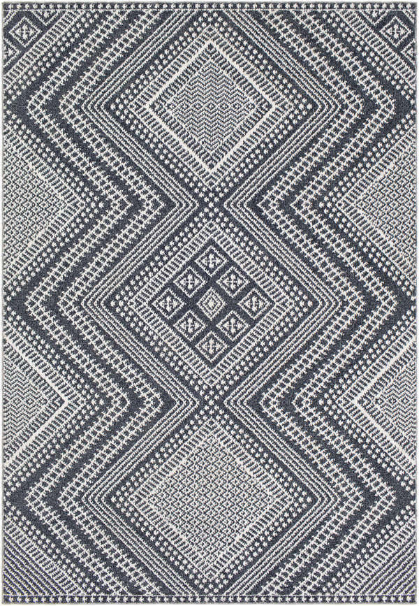 Close-up of the Madison Black&White Area Rug, featuring a geometric diamond pattern in black, gray, and white. Bohemian style. Design-Rectangle-5373