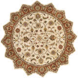Close-up of the round Medaryville Area Rug. Hand-tufted wool rug with beige, red, and brown floral pattern. Clearance. Design-Star