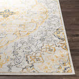 Close-up of the Mehoopany Area Rug showing its light beige base with burnt orange, mustard, and navy bohemian design. Front