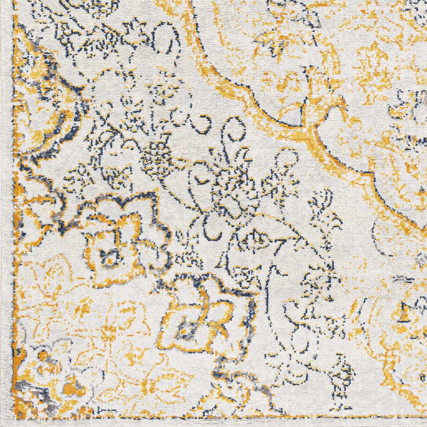 Close up of the Mehoopany Area Rug showing its burnt orange, navy, and gray bohemian floral pattern on a light beige background. Swatch