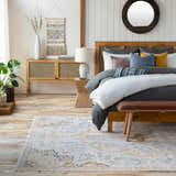 Bohemian bedroom scene with the Mehoopany Area Rug in burnt orange and gray, styled with a wooden bed and neutral decor. Roomscene-Rectangle