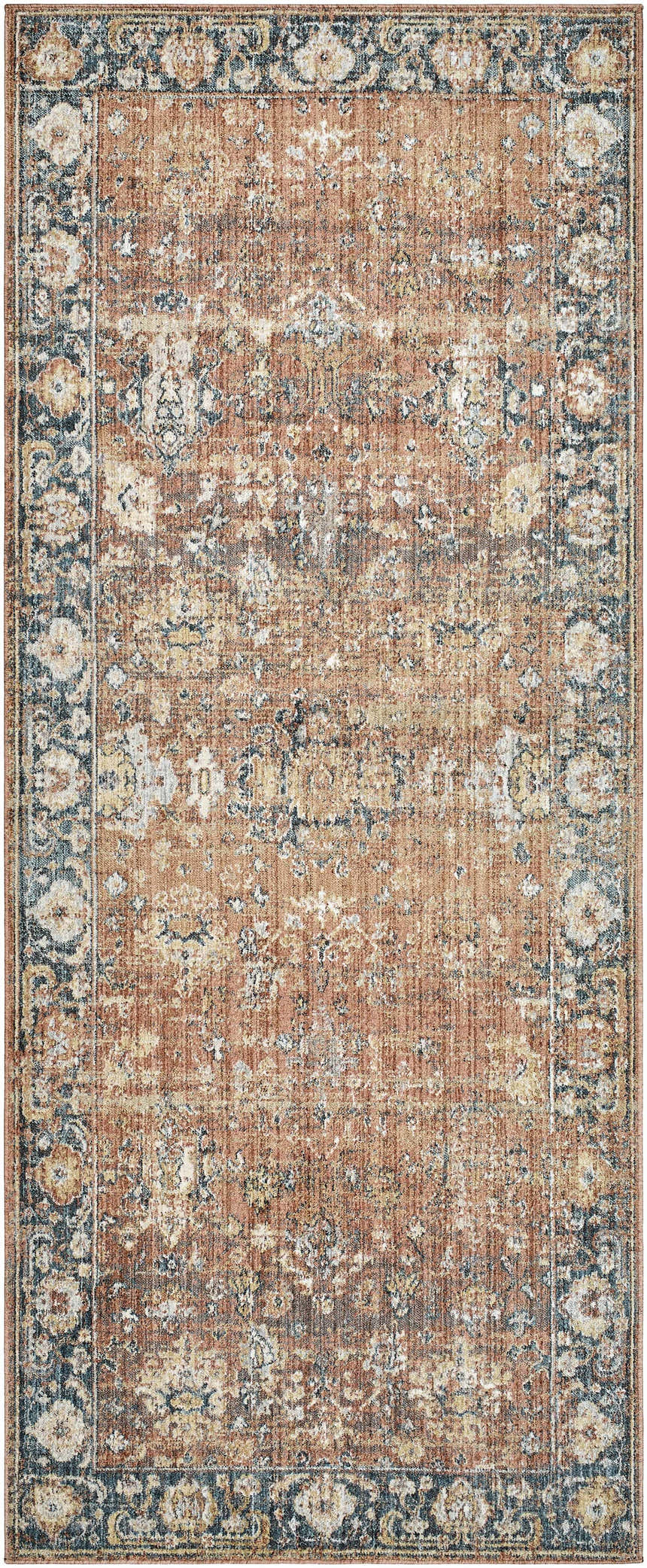 Close-up of the Mele Area Rug, a machine-woven rug in burnt orange, bone, and dark brown with a traditional floral pattern. Design-Runner