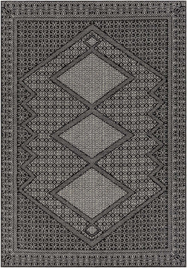 Close-up of the Merkez Area Rug. Machine woven rug in dusty sage and gray with diamond and geometric patterns. Design-Rectangle-57