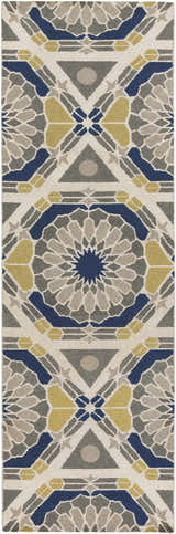 Close-up of the Mesena Area Rug. Hand-knotted wool rug in ivory, light gray, navy, and tan with a geometric pattern. Design-Runner-268