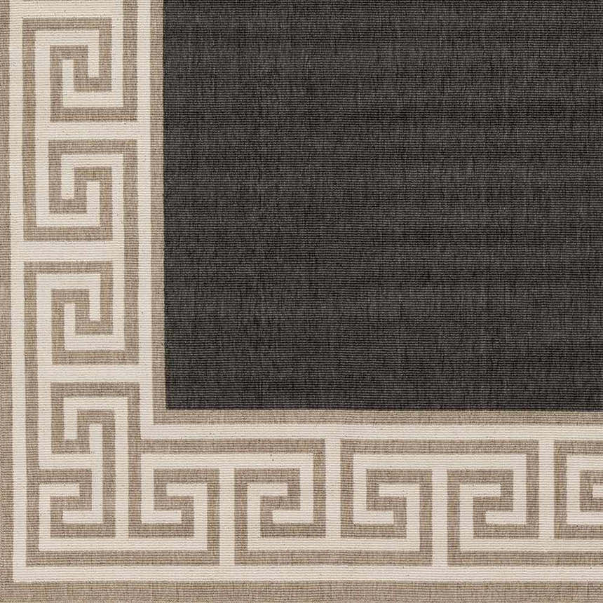 Close-up of the Michael Area Rug: a charcoal rug with a Greek key border in beige and white. Swatch