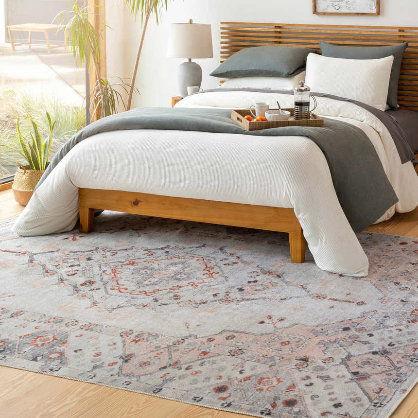 Bedroom scene with a Brick Red and Gray Midtown Washable Area Rug under a light wood bed with gray and white bedding. Roomscene-Rectangle
