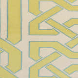 Close-up of the Milano Area Rug. Hand-woven wool rug in ivory, light olive, and seafoam with a geometric pattern. Swatch