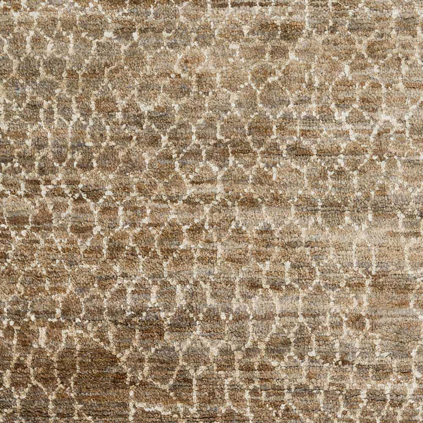 Close-up of the Milbridge Clearance Jute Rug, featuring a textured beige and brown geometric pattern. Hand-knotted jute rug. Swatch