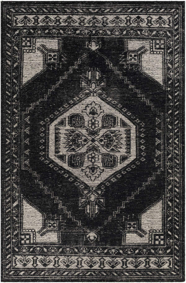 Close-up of the hand-knotted Minapan Premium Area Rug. Black and cream cotton and wool oriental rug with traditional patterns. Design-Rectangle-5686