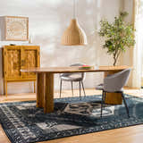Dining room with wood table, gray chairs, and black and cream Minapan Premium Area Rug. Roomscene-Rectangle