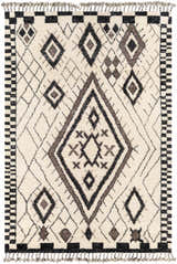 Close-up of the hand-knotted Minyama Area Rug. Bohemian style with black, charcoal, cream, and gray diamond pattern and fringe. Design-Rectangle-69