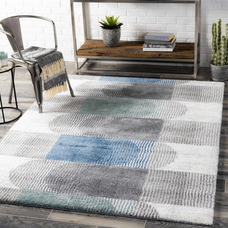 Melber Area Rug - Clearance
