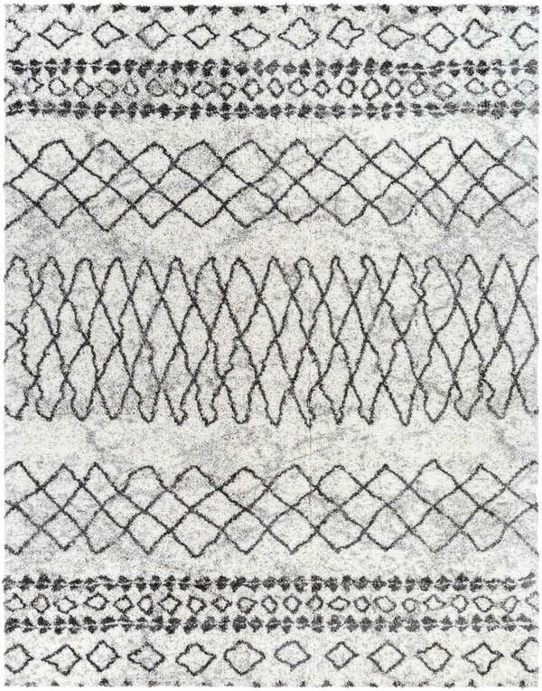 Close-up of the Moulden Area Rug. Shag rug with charcoal diamond and geometric patterns on a cream background. Design-Rectangle-71010