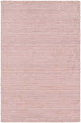 Close-up of the hand-loomed Millinocket Area Rug in dusty pink viscose, showing texture and subtle horizontal lines. Design-Rectangle-23
