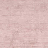 Close-up of the Millinocket Area Rug. Dusty pink, hand-loomed, contemporary style, and soft viscose texture. Swatch