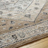 Close up of Minal Luxe Thick Area Rug showing dark gray and medium gray traditional pattern and soft texture. Texture