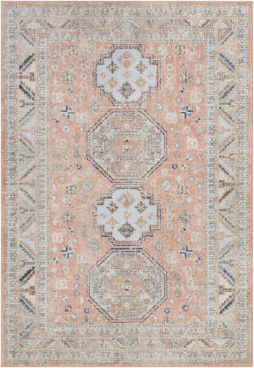 Close-up of the Mantador Area Rug. Features a traditional, bohemian design in charcoal, ink blue, and light beige tones. Design-Rectangle-5373