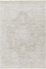 Close-up of the Monto Luxe Rug, a machine-woven rug in cream, taupe, and gray with a subtle, traditional pattern. Design-Rectangle-575