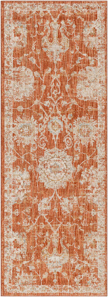 Close-up of the Manawan Thick Luxe Area Rug. Brick red rug with cream, beige, and charcoal traditional floral pattern. Design-Runner-2773