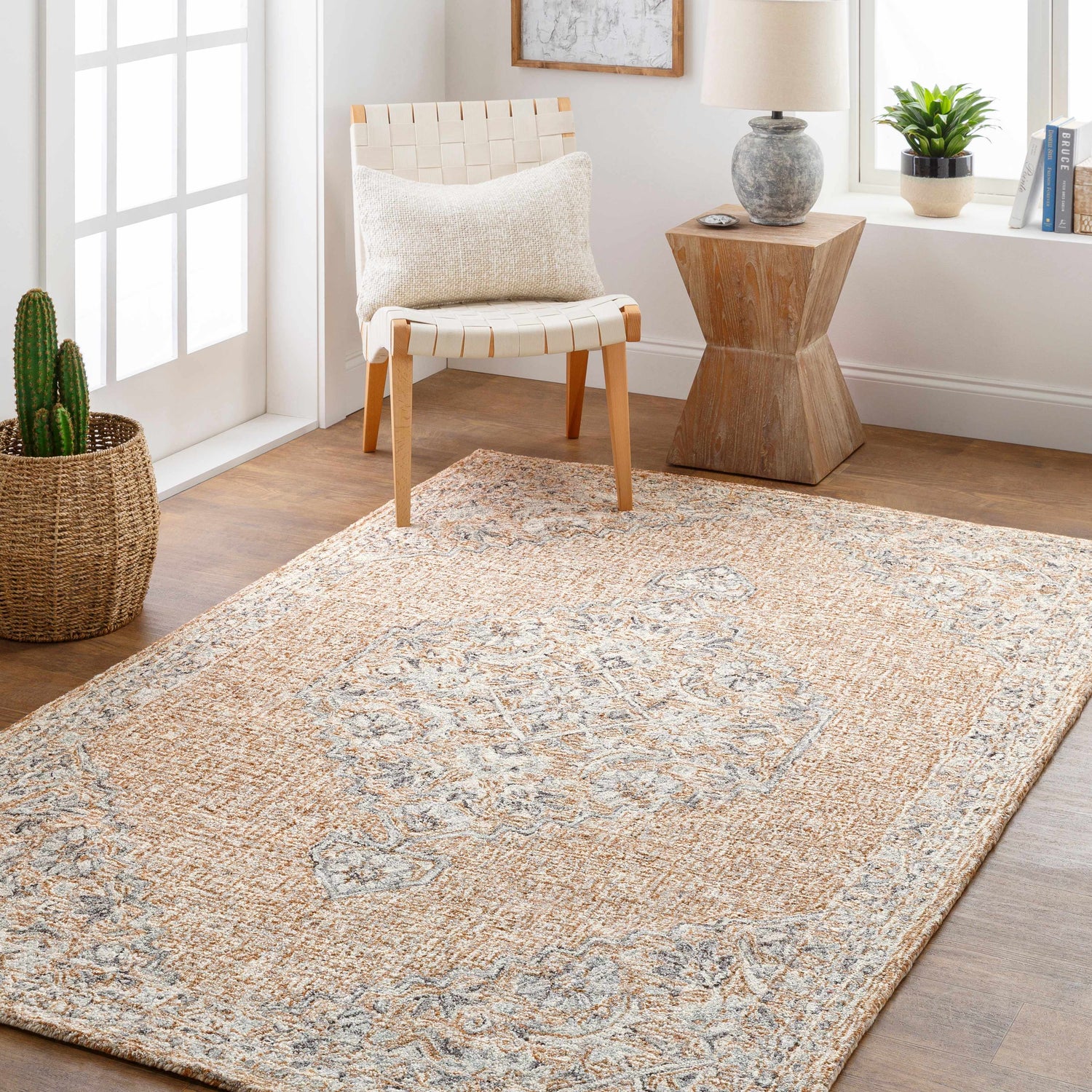 Light and airy room featuring a tan Modimolle Area Carpet with a traditional Persian-inspired design. Roomscene-Rectangle