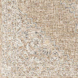 Close-up of the hand-tufted Modimolle Area Carpet. Features a traditional Persian design in brown, camel, and cream tones. Swatch